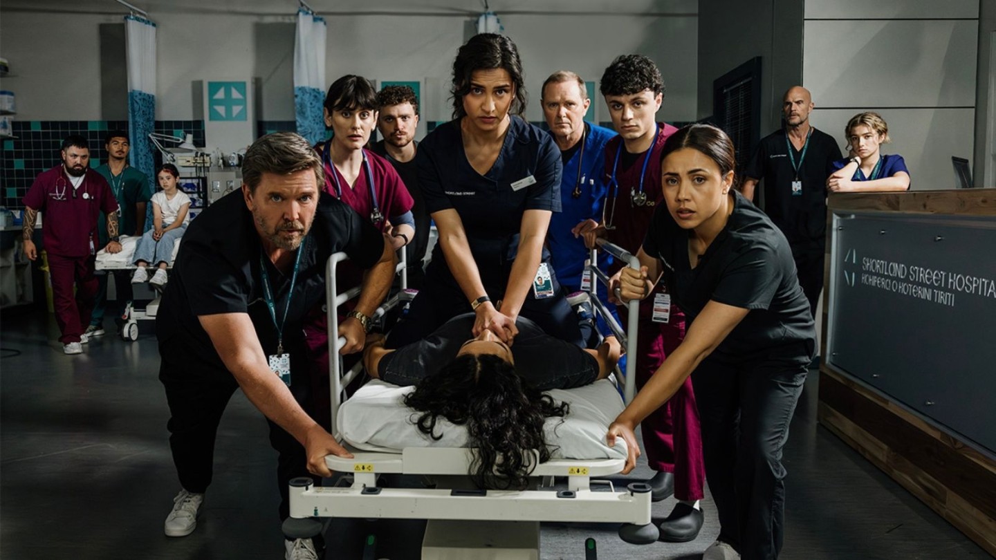Promotional image for the medical soap opera Shortland Street, featuring an ensemble cast of doctors and nurses in a high-stakes hospital setting