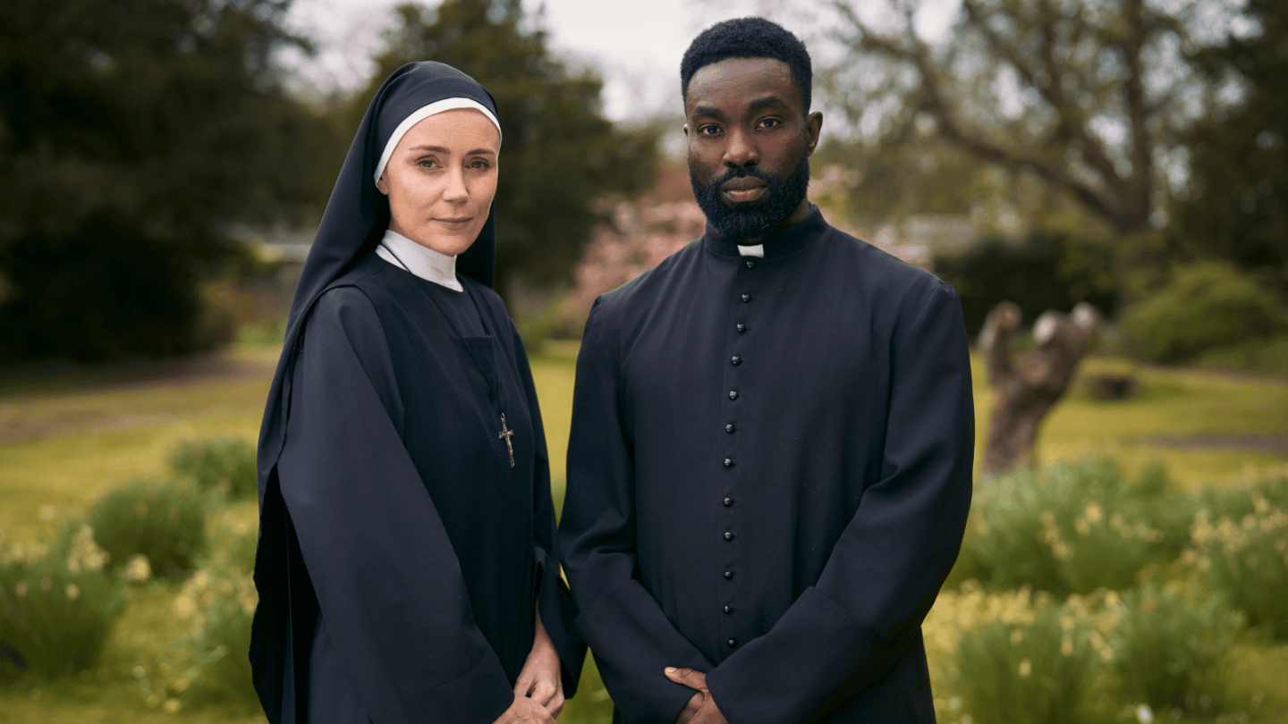 A nun and a priest stood in a garden in Channel 4s drama Falling