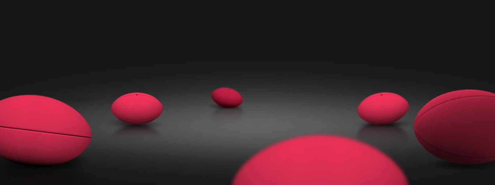 Rugby balls in Freely brand style
