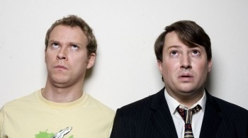 Promotional image for the TV series Peep Show. From left to right: Robert Webb as Jeremy "Jez" Usborne and David Mitchell as Mark Corrigan