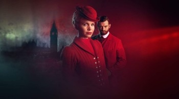 Promotional image from Miss Scarlet and The Duke showing two Victorian detectives in red-toned period costume against a dramatic London backdrop.