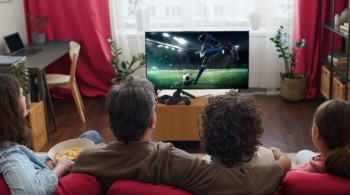 People watching the World Cup on TV