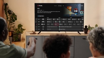 Family watching children's TV on Freely, with the TV Guide highlighting Milo and live channel listings on a smart TV.