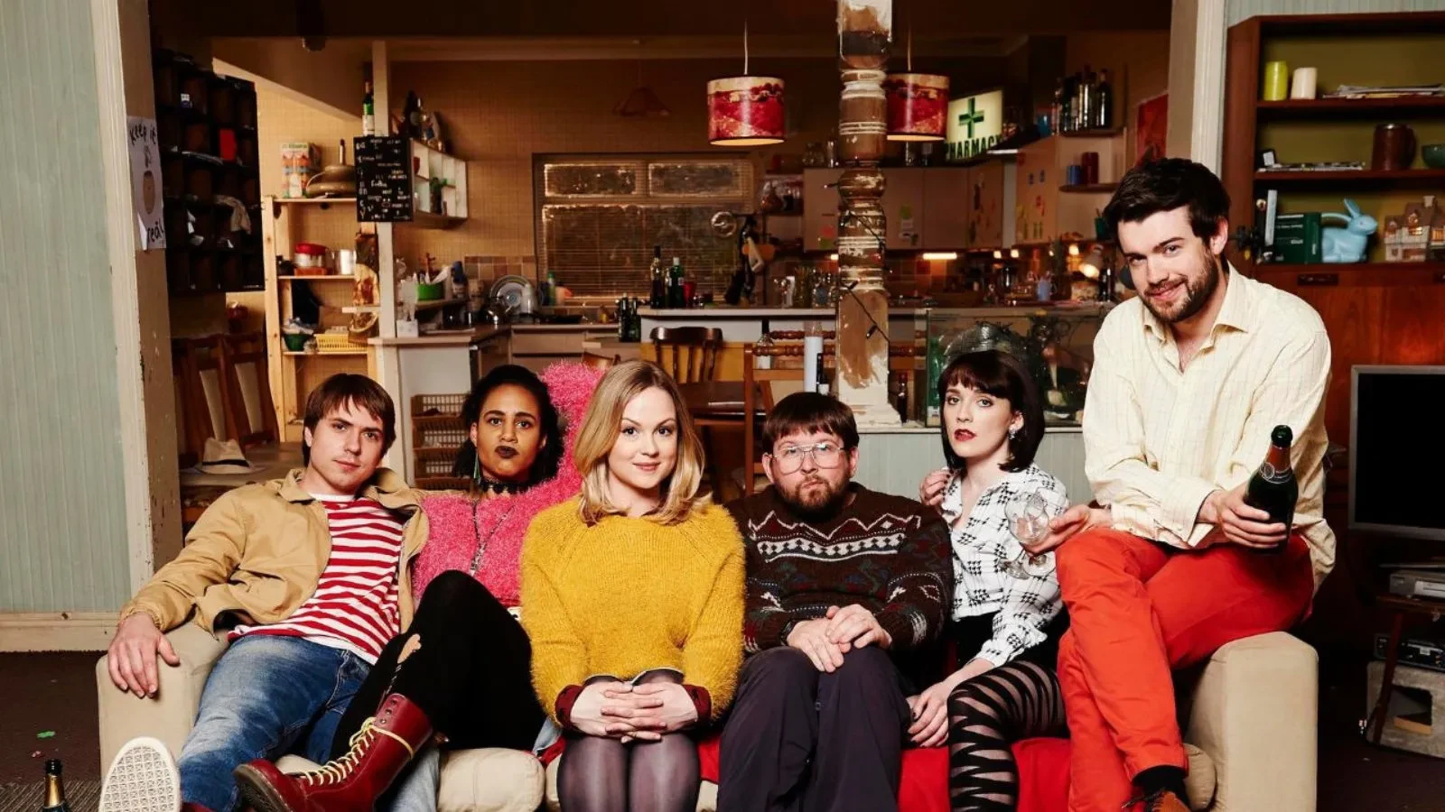 Promotional image for the Channel 4 sitcom Fresh Meat, featuring the main cast of student housemates. From left to right: Joe Thomas (Kingsley), Zawe Ashton (Vod), Kimberley Nixon (Josie), Greg McHugh (Howard), Charlotte Ritchie (Oregon), and Jack Whitehall (JP)