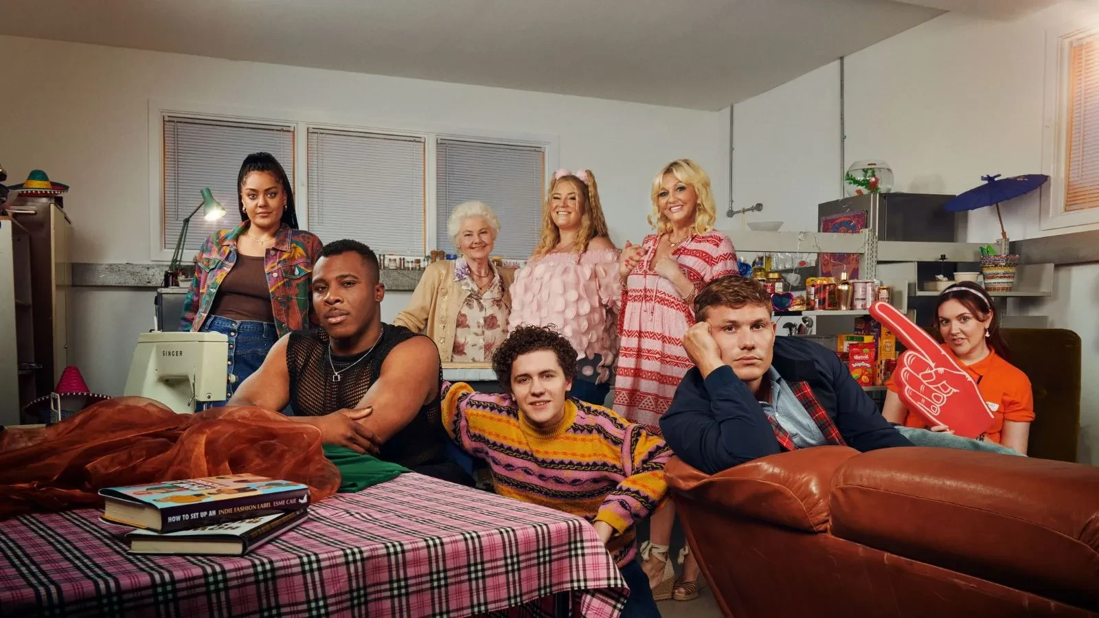 Promotional image for the TV series Big Boys. From left to right: Izuka Hoyle as Corinne, Olly Levy as Jory, Annette Badland as Peggy, Dylan Llewellyn as Jack, Katy Wix as Jules, Camille Coduri as Anne, Jack Rooke as himself, and Harriet Webb as Shannon