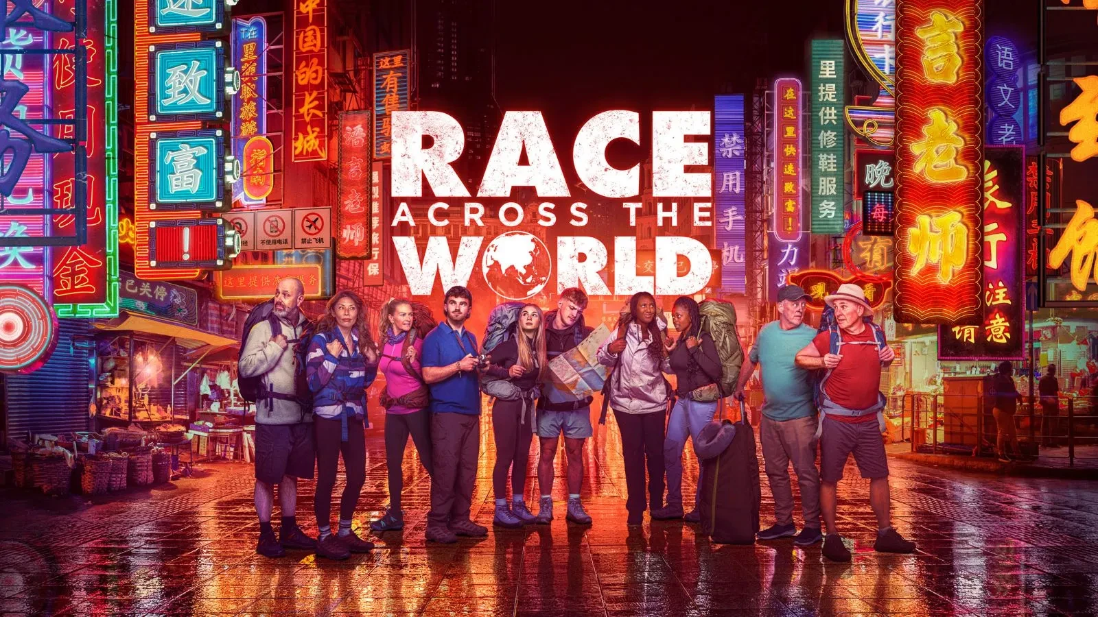 Competitors in Race Against the World stood with rucksacks on in an Asian colourful city street