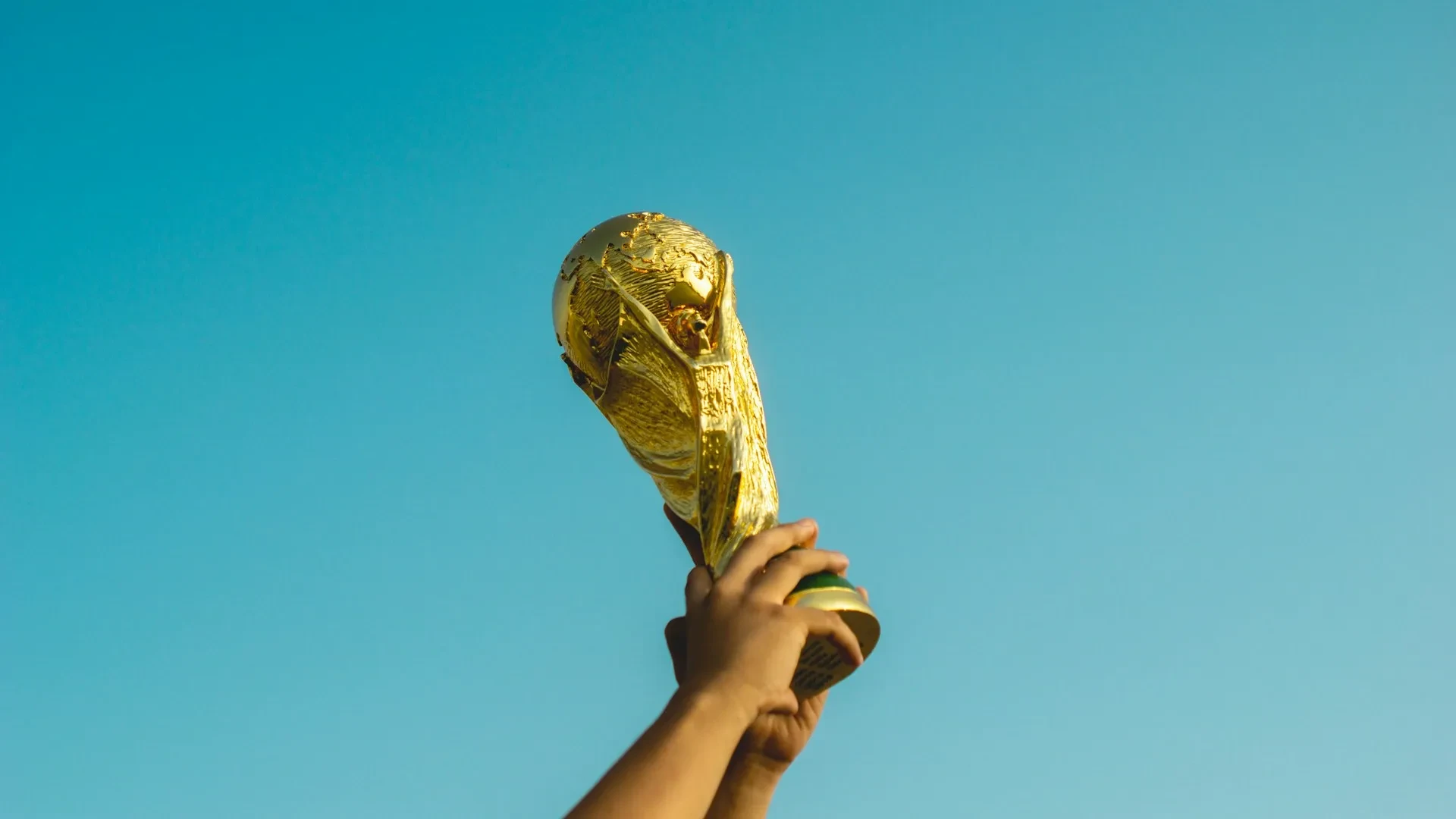 FIFA World Cup trophy is held aloft