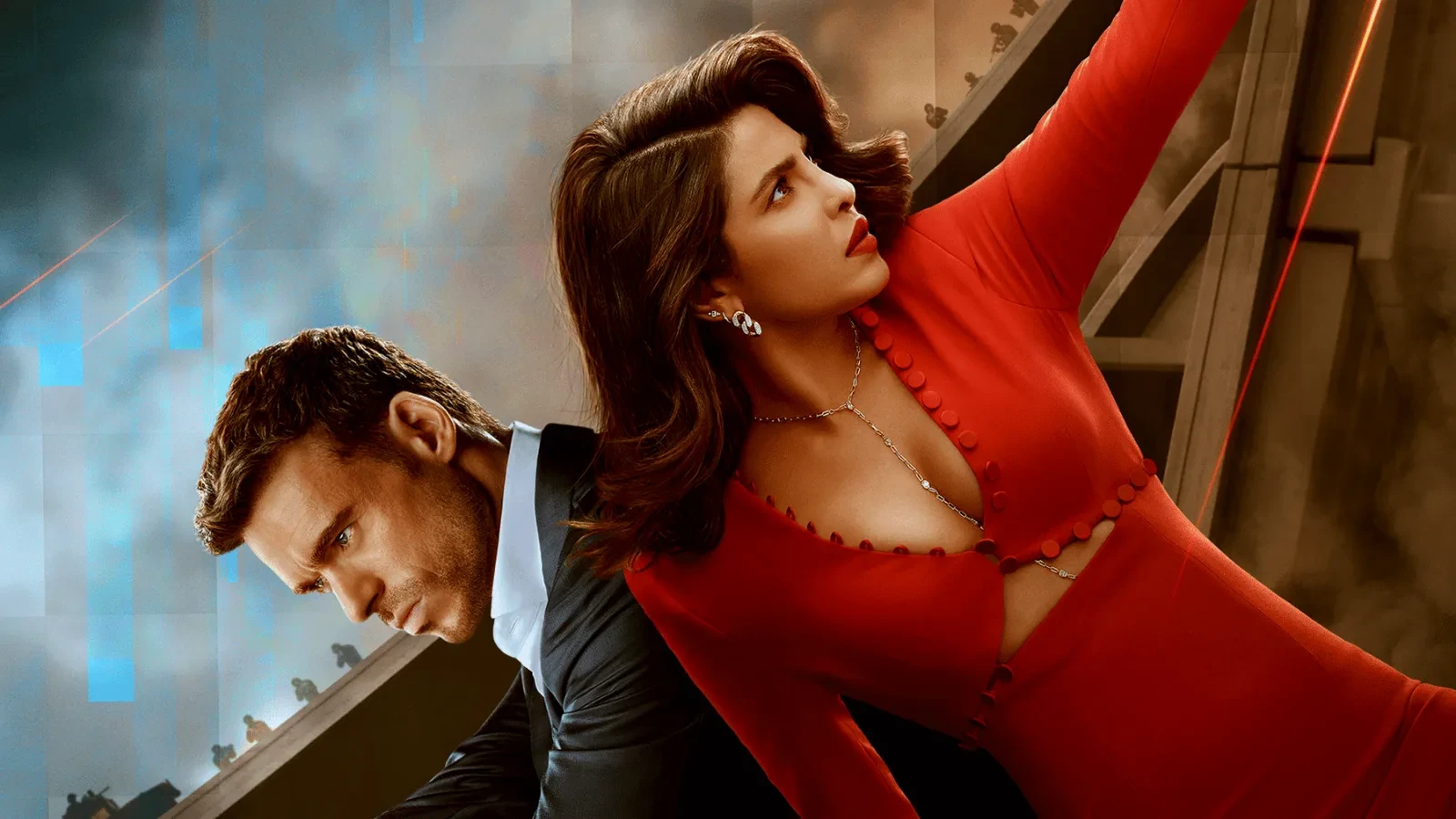Two people posed back-to-back on a slanted structure, one in formal dark attire and the other in a red outfit, against a stylised action backdrop. 