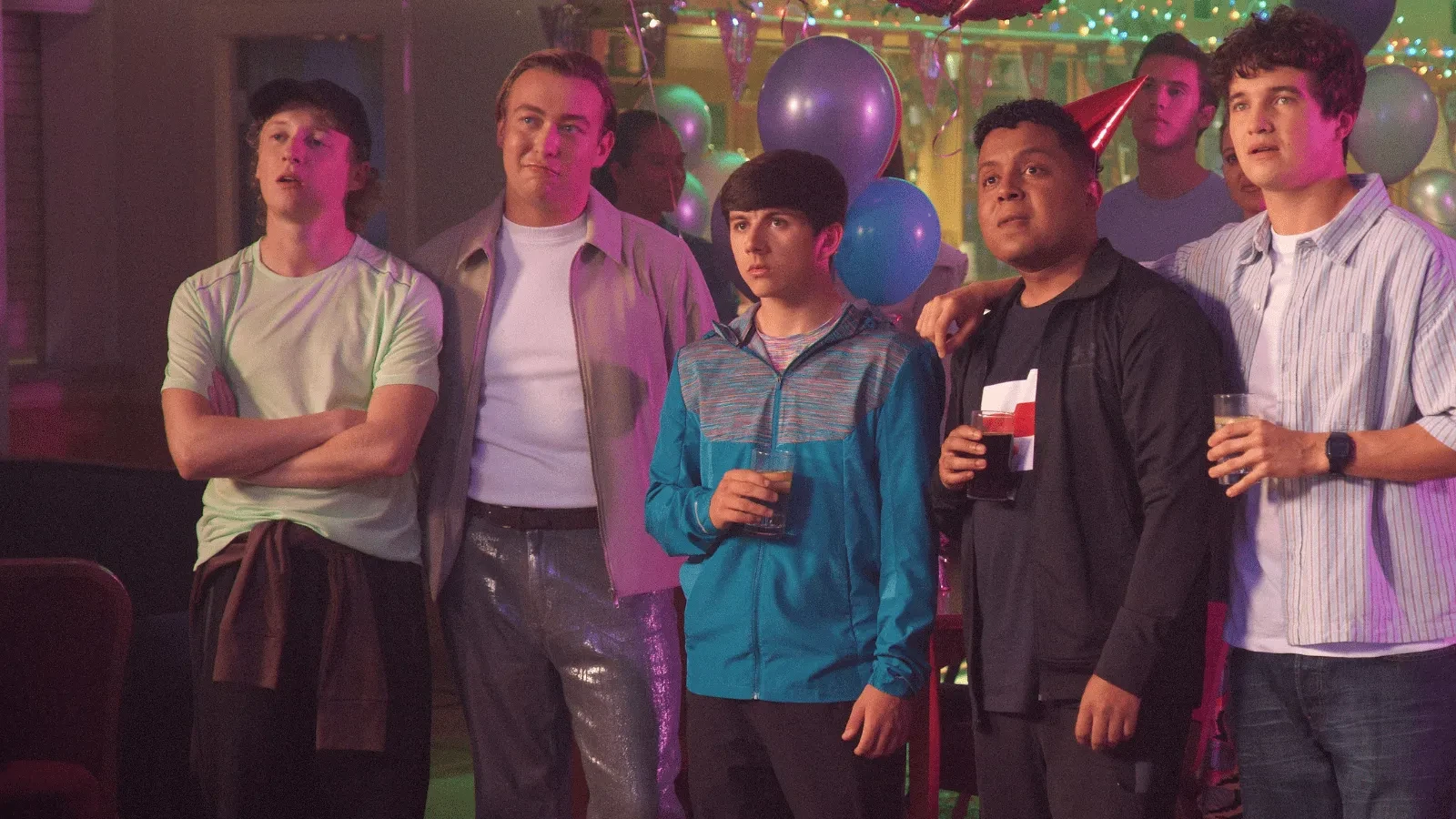 Imagery for G'wed Season 3. Teenagers at a party staring at something in the distance.