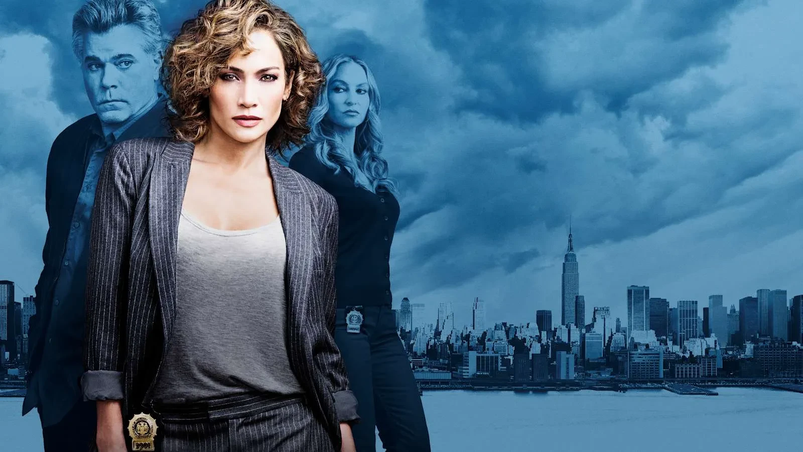 A police officer in a suit stood against a blue background of a city in the drama Shades of Blue