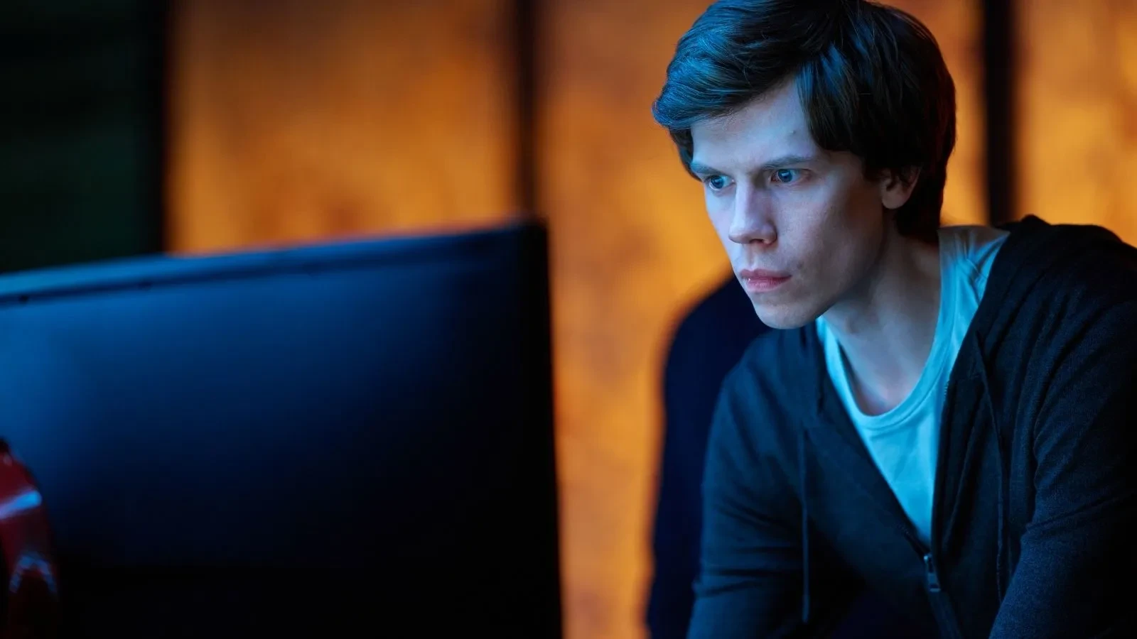 Character monitors a computer screen during a high-stakes cyberattack investigation in The Undeclared War.