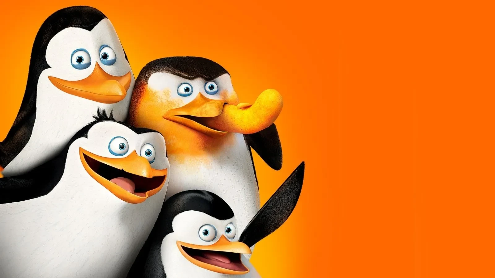 Promotional movie image for Penguins of Madagascar. Four animated penguins against an orange background.
