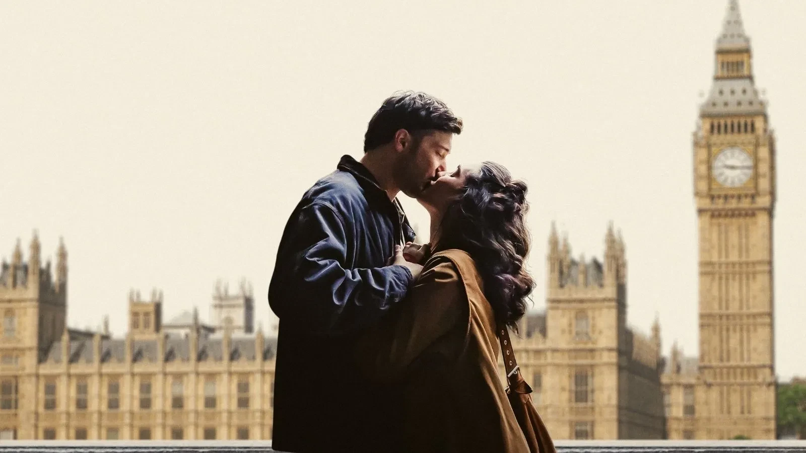 A young couple kissing in front of the Houses of Parliament. Key art for Channel 4s drama Break Clause.