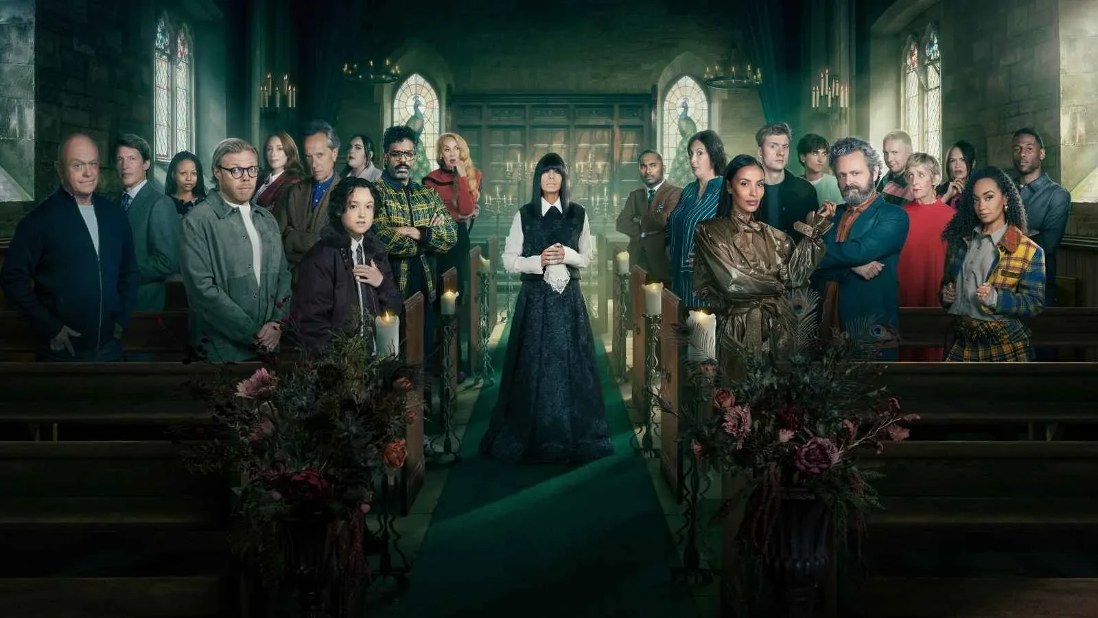 Cast of Celebrity Traitors standing inside a candlelit church during the BBC reality competition series.