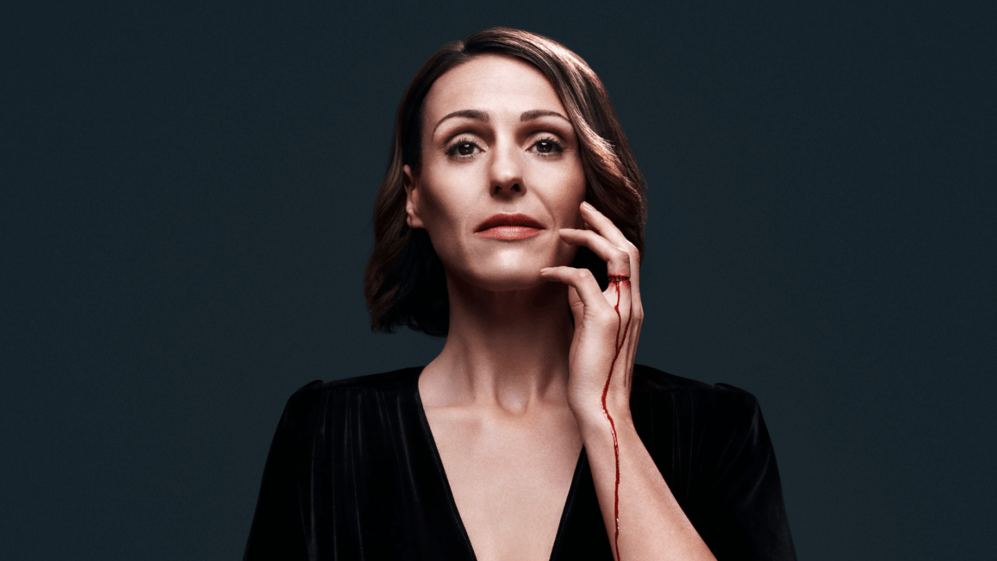 Suranne Jones against a black background with blood dripping doww her arm in the new season of Doctor Foster