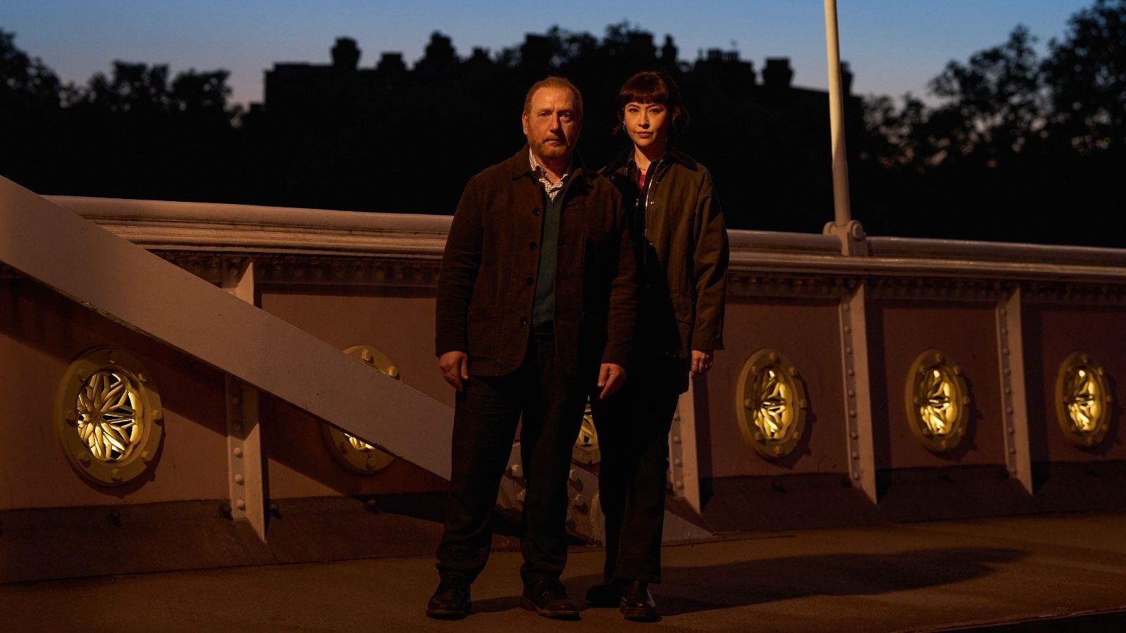 A man and a women stood on a bridge in the Chelsea Detective