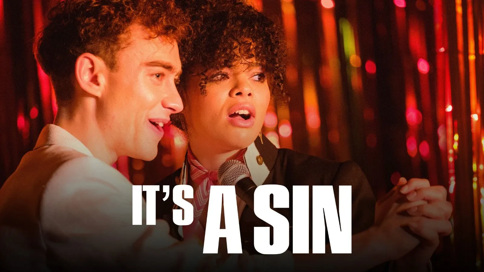 A man and women against red curtains with text that reads it's a sin