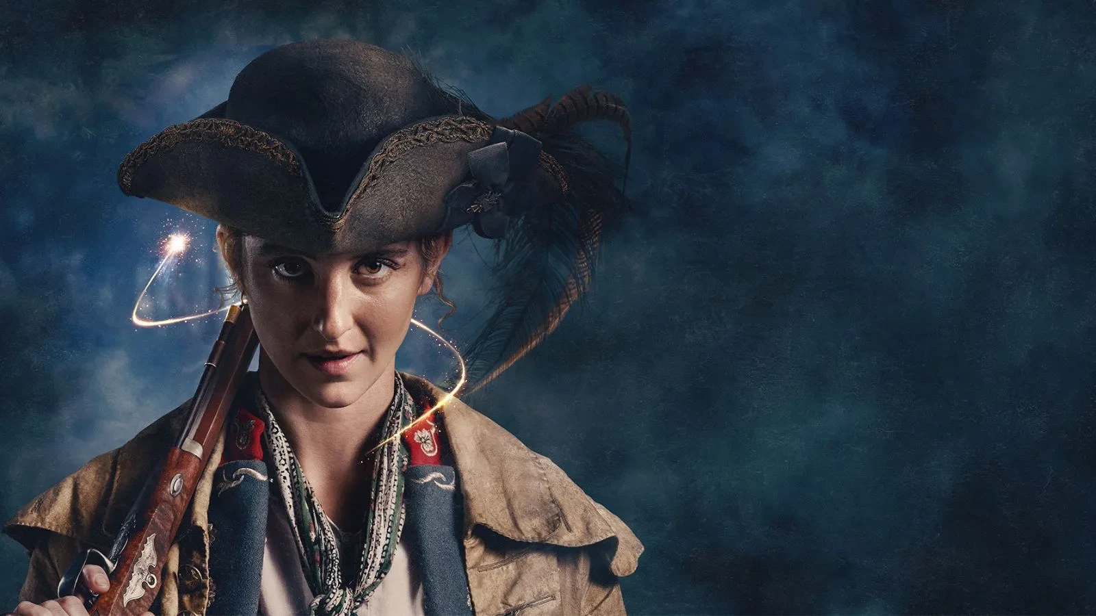 Young women with a pirates hat and a leather jacket holding a weapon against a stormy background