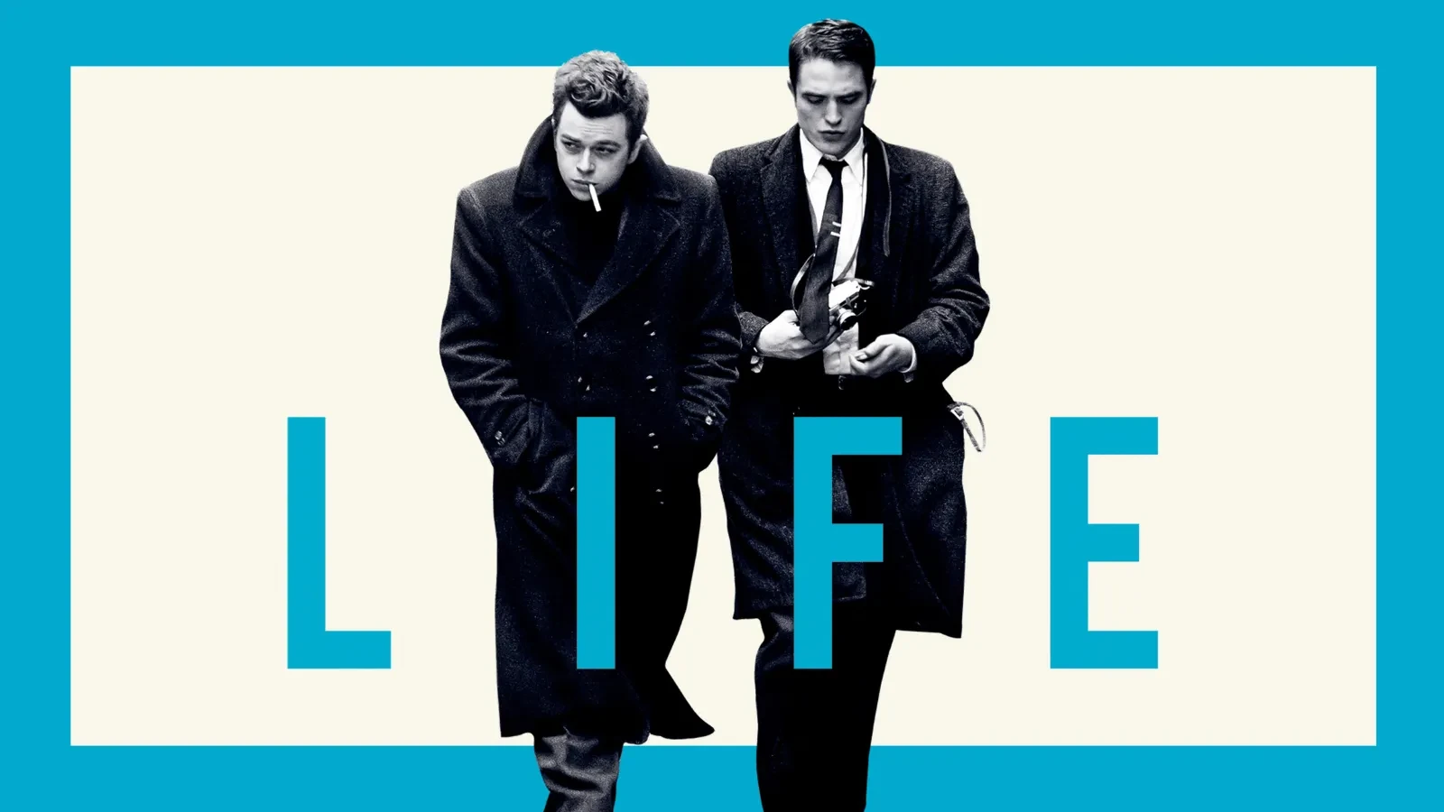 Two men in black and white wearing suits walking towards the camera. A blue boarder surrounds the image with blue writing that reads Life in capital letters.