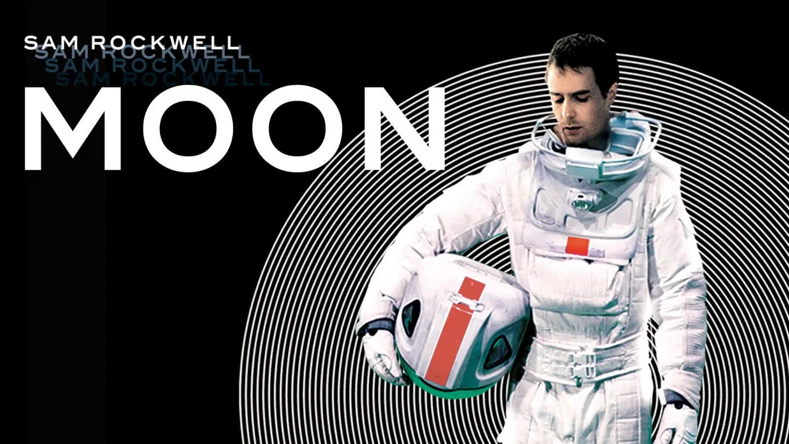 An astronaut wearing a space suite against a black background with writing that reads Moon