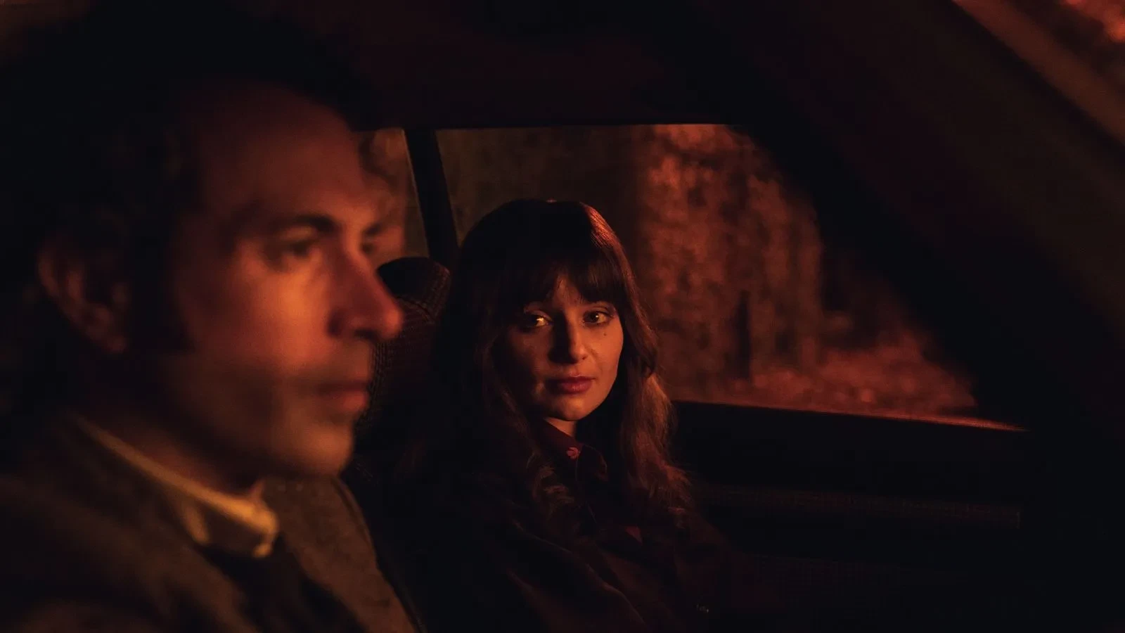 Tom Cullen and Lola Petticrew sat in a car in the drama Trespasses