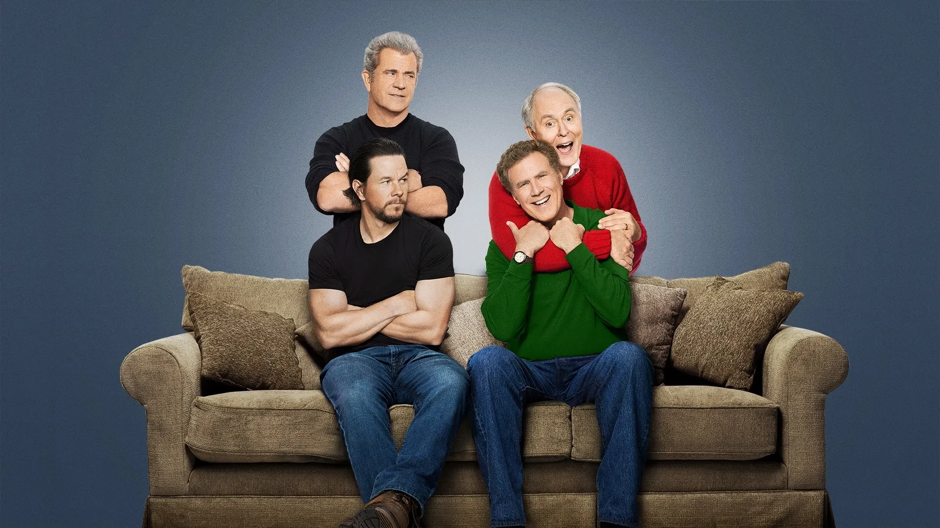 Promotional image for the film Daddy's Home 2, showing four men around a beige couch with playful and contrasting expressions, set against a blue background.