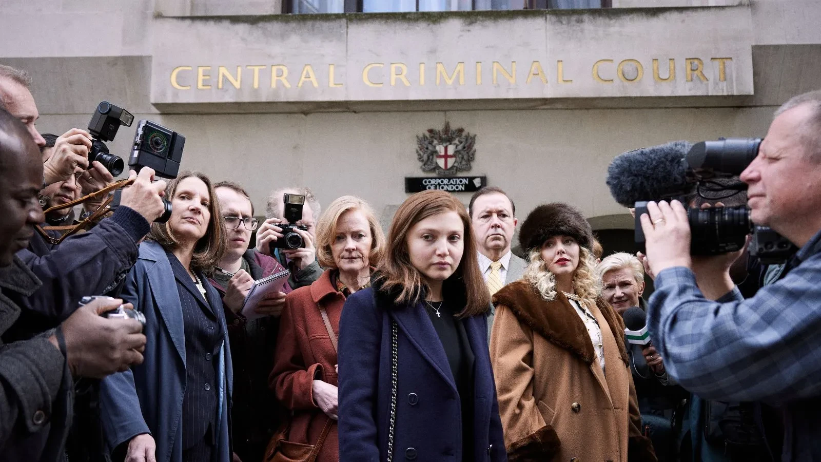 Crowd of photographers outside Central Criminal Court building in London.
