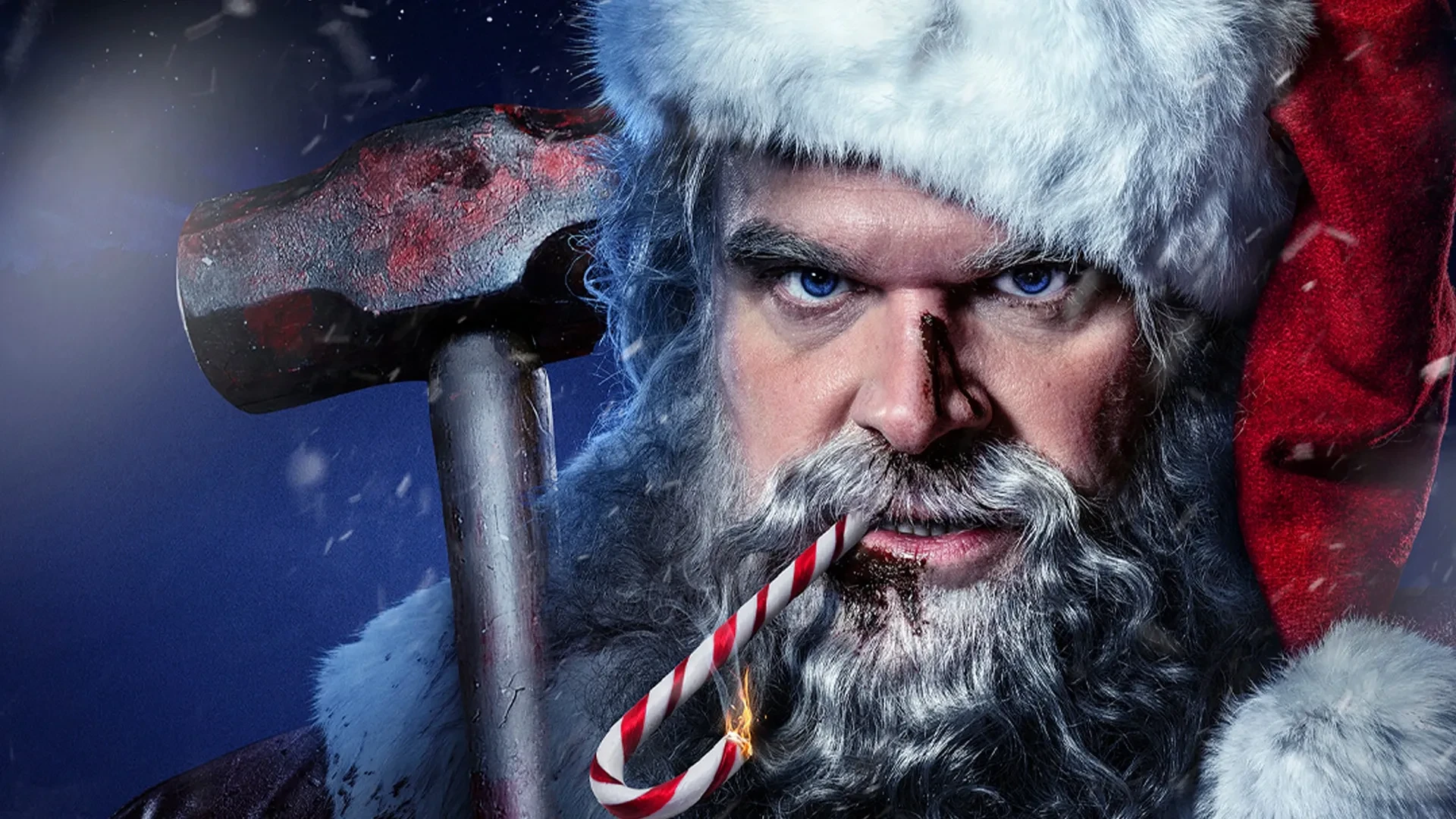 Promotional poster art for the 2022 film Violent Night, showing a fierce-looking Santa Claus with a bloodied face, gripping a sledgehammer and biting a candy cane against a dark, snowy background.