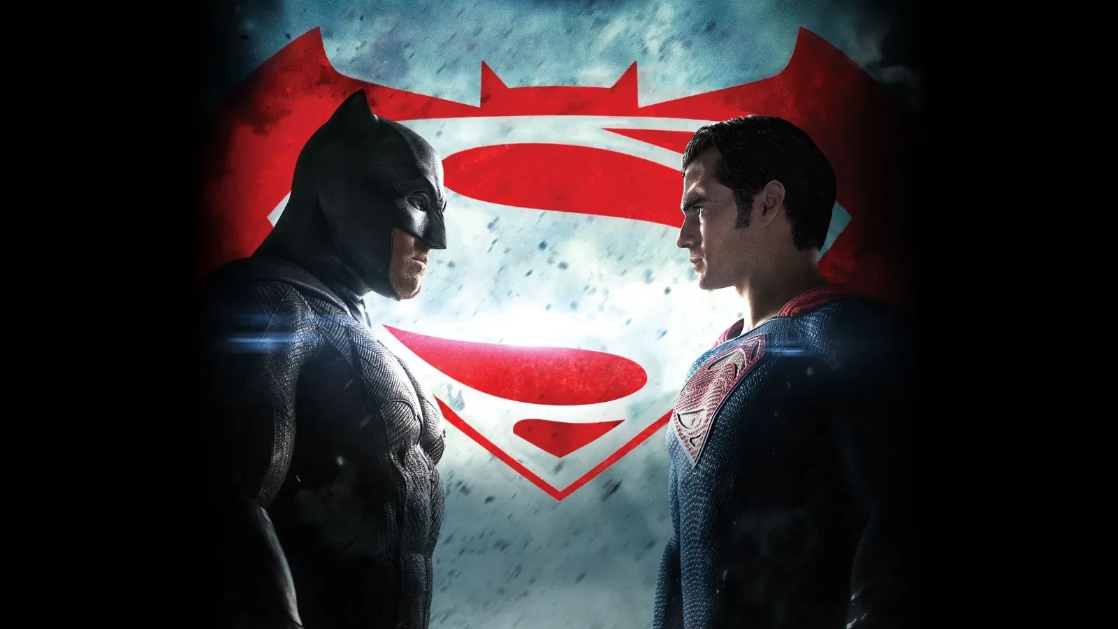 A dramatic scene of Batman and Superman standing face‑to‑face in a tense showdown, set against a stormy sky with a large red combined bat and shield emblem glowing behind them.