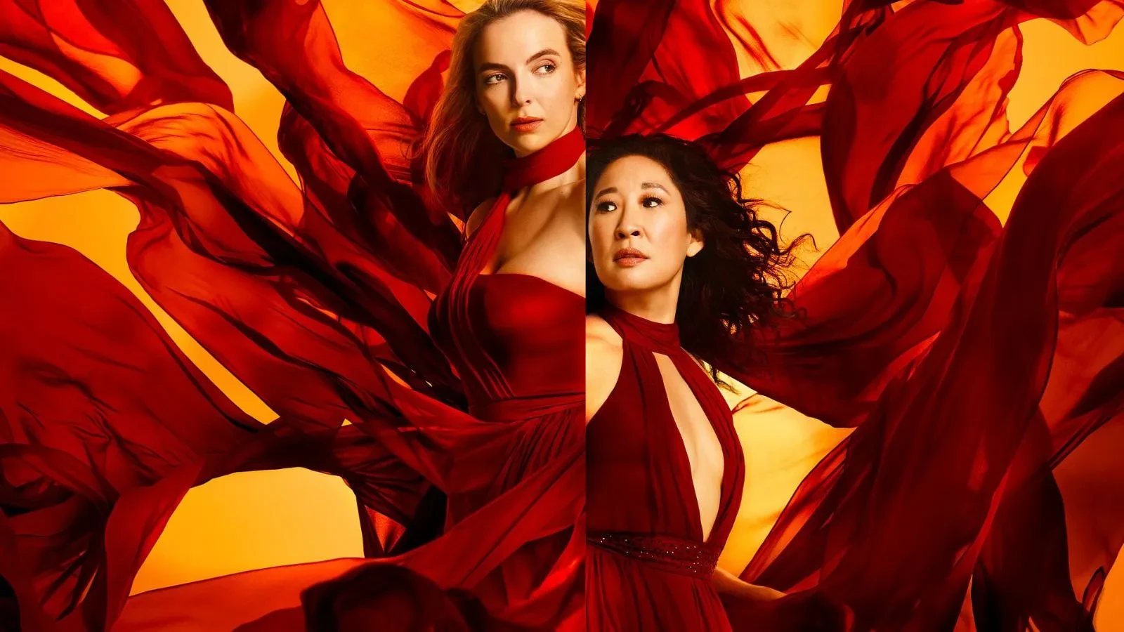 Two figures wearing flowing red dresses surrounded by billowing red fabric against a bright orange background.