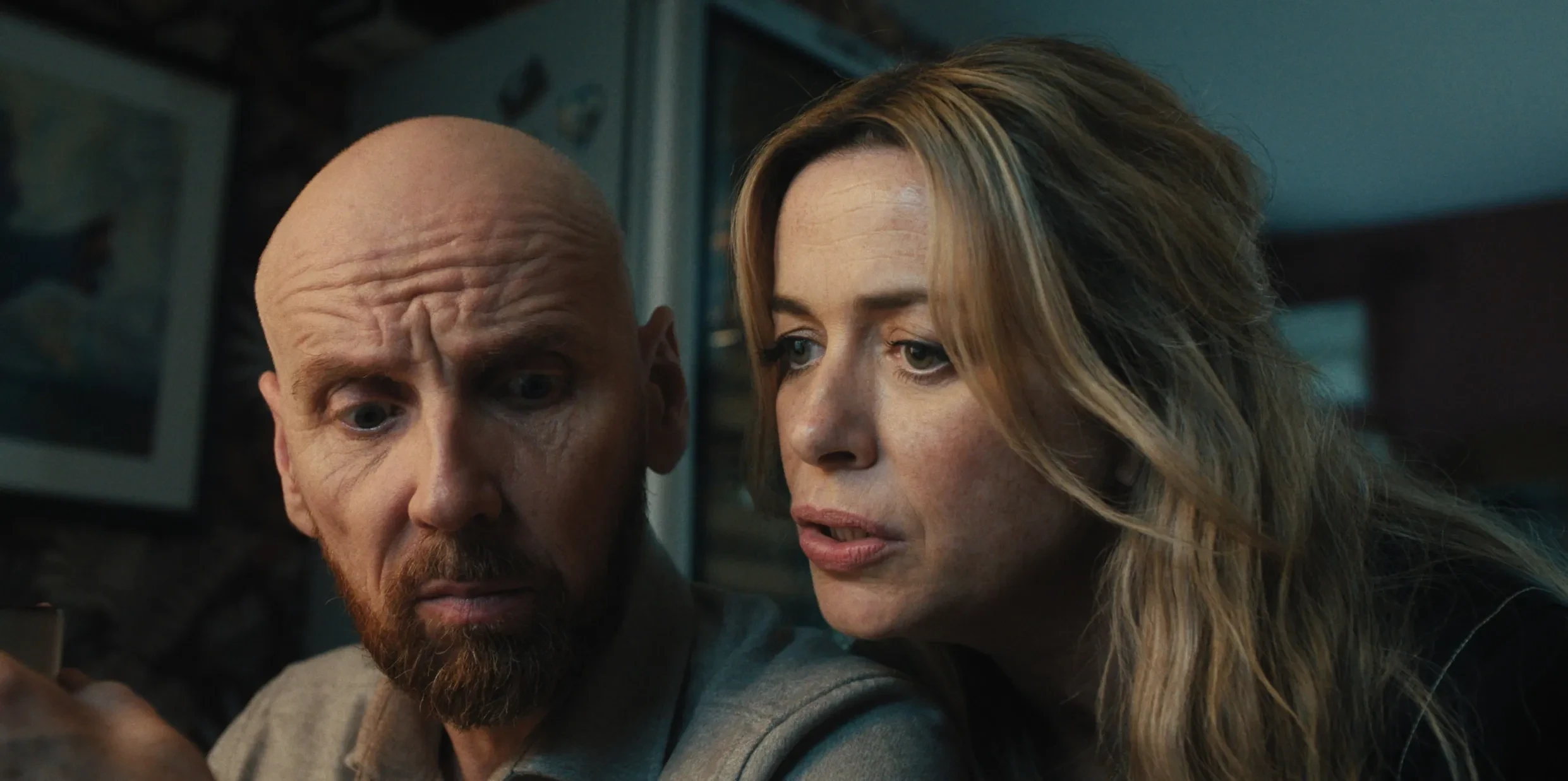 Ewen Bremner and Eve Myles appear in Coldwater. In the image, Myles whispers into Bremner's ear.