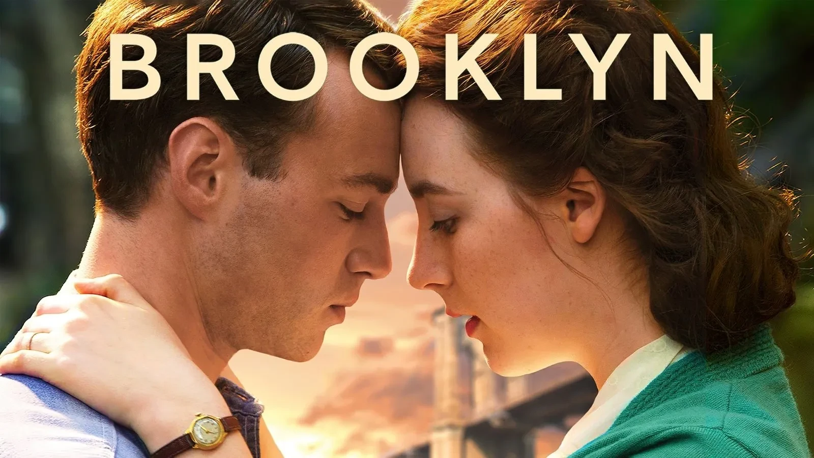 Saoirse Ronan and Emory Cohen embraced with their foreheads touching in the film Brooklyn