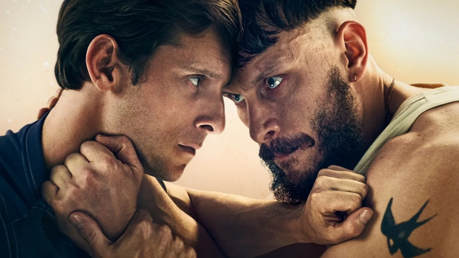 Close up of Richard Gadd and Jamie Bell with their arms against eachother in a violent manner in the BBC drama Half Man