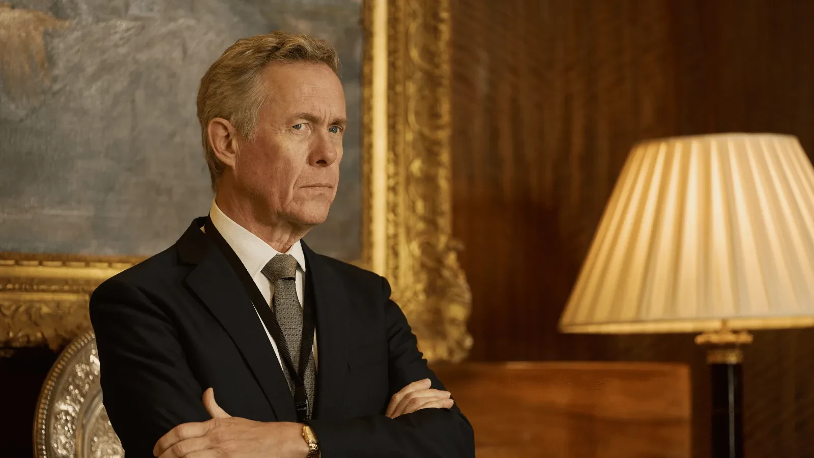 A government official in a suit stood in an office