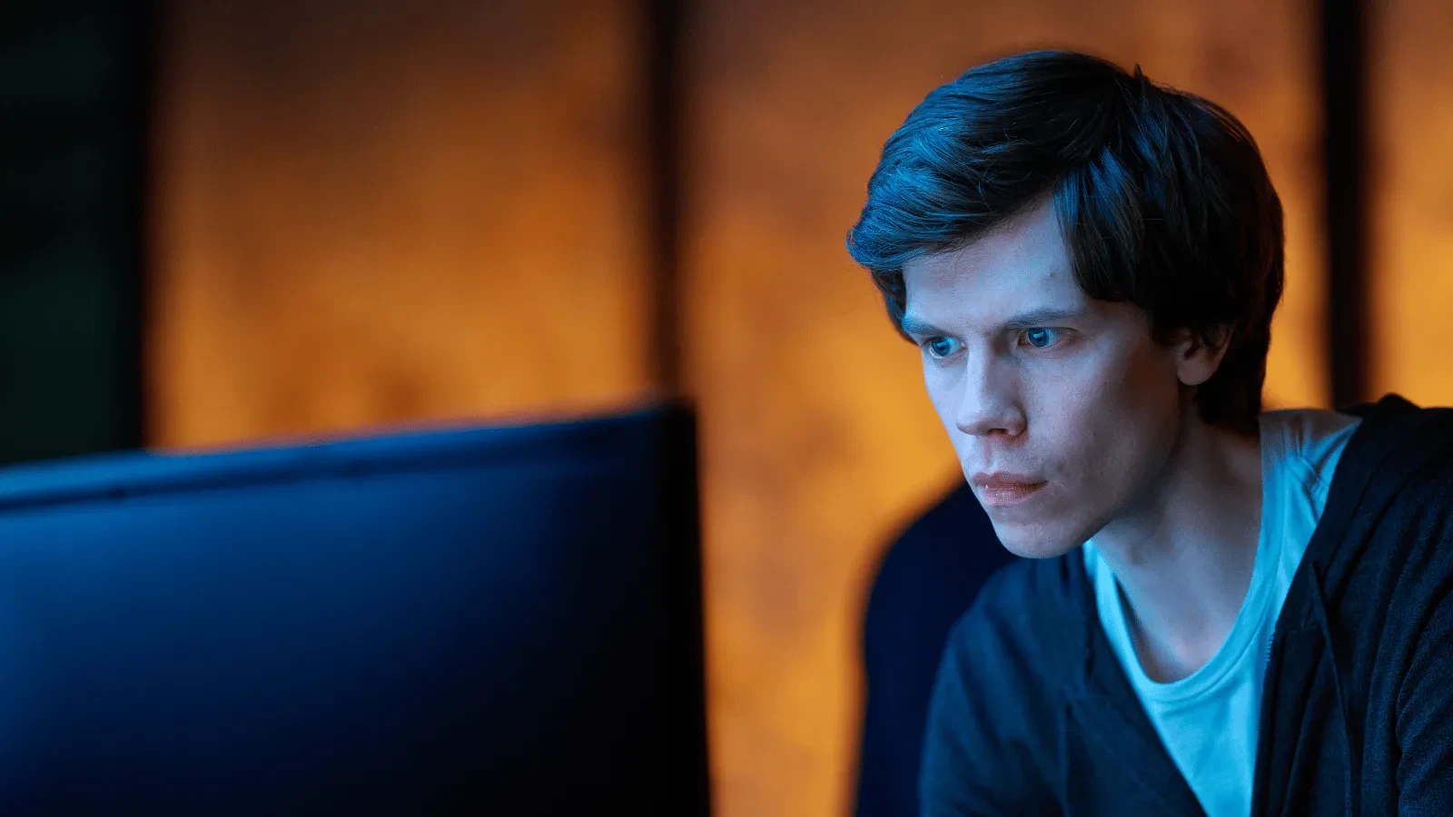 Character monitors a computer screen during a high-stakes cyberattack investigation in The Undeclared War.