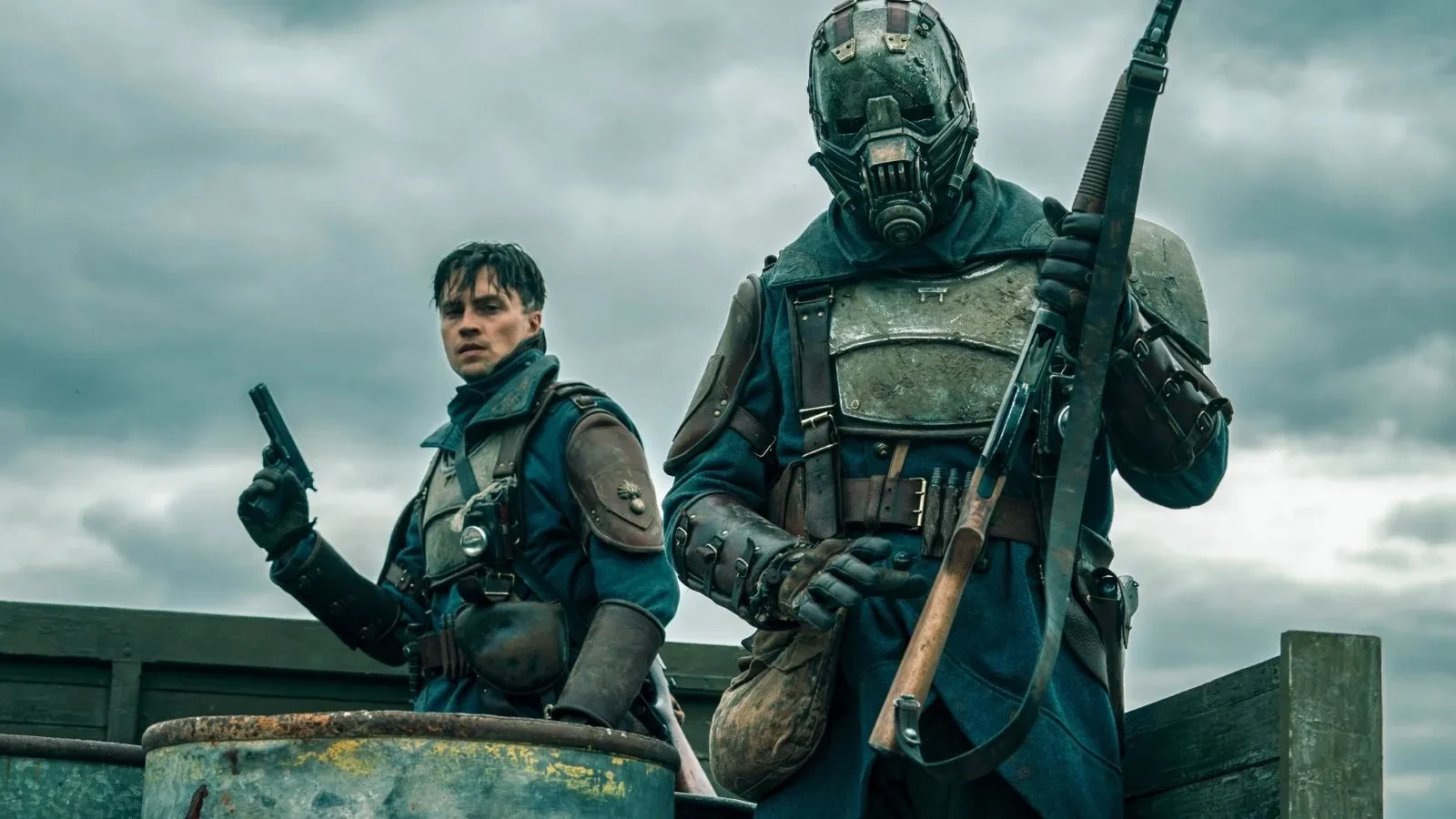Sentinels TV show poster showing armoured soldiers with futuristic weapons in a dystopian sci-fi setting beneath dramatic storm clouds.